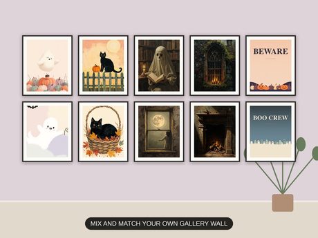 Ten Halloween prints from the bundle framed together as a gallery wall above a console table