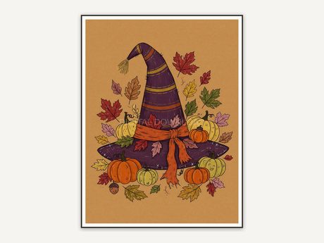 Witch hat with autumn leaves and pumpkins
