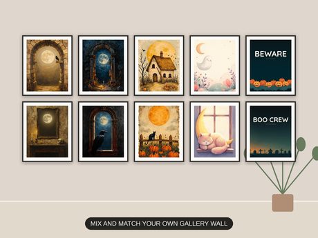 Ten Halloween prints from the bundle framed together as a gallery wall above a console table