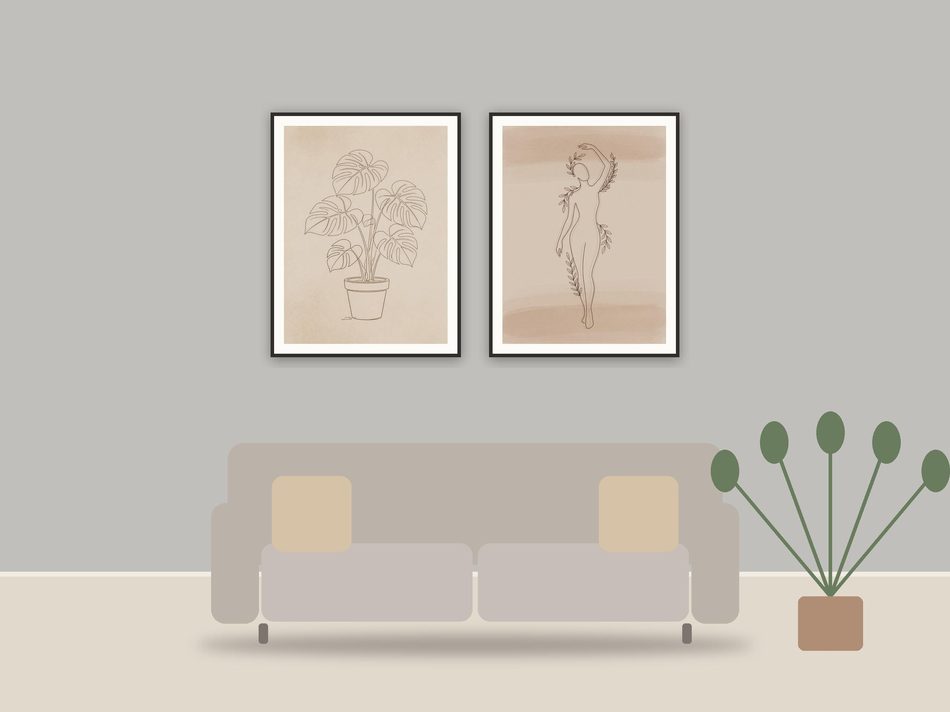 minimalist one-line art printable art framed above a sofa in a styled living room
