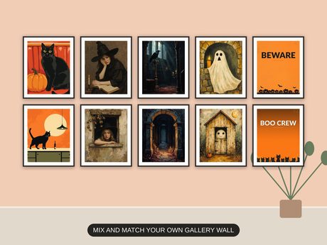 Ten Halloween prints from the bundle framed together as a gallery wall above a console table